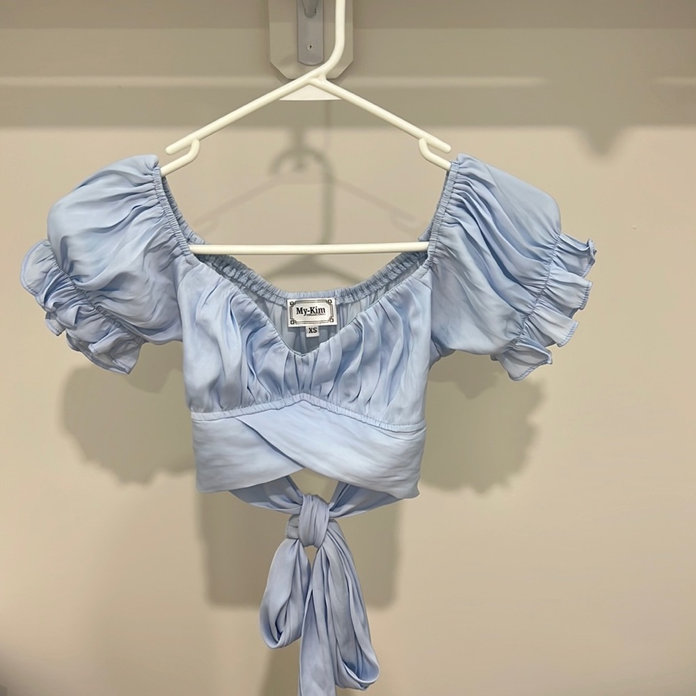 XS light blue wrap around short sleeve.